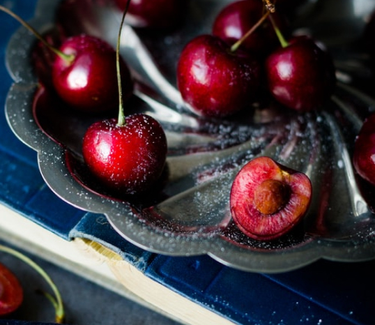 Cherries on metal plate